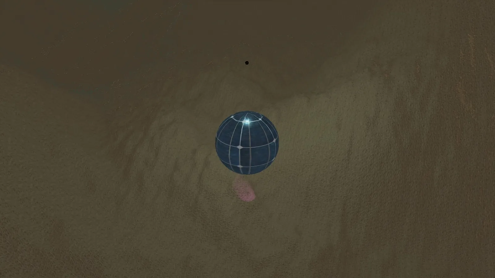 A reflective blue tiled sphere lit with physically based shading above rough brown terrain